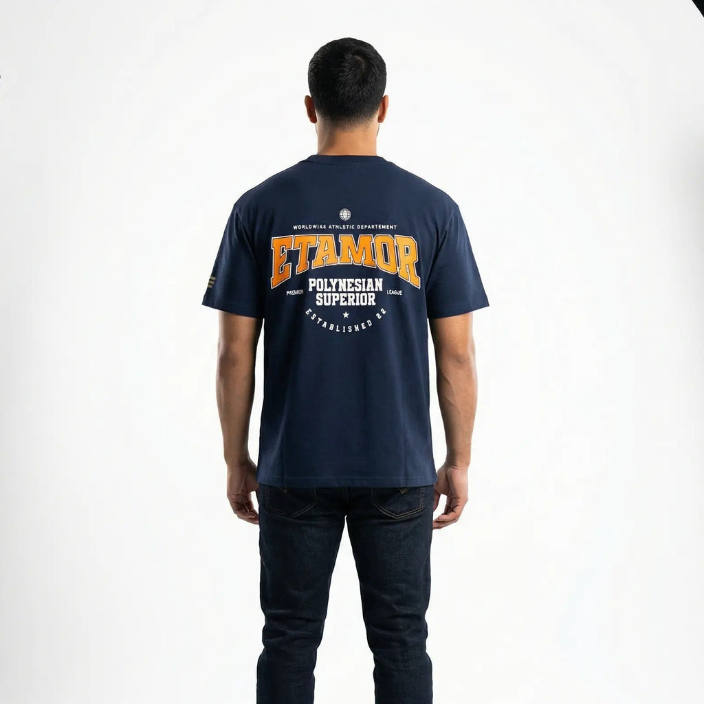 Person wearing a navy blue t-shirt with 'ETAMOR' branding on the back, standing against a white background.